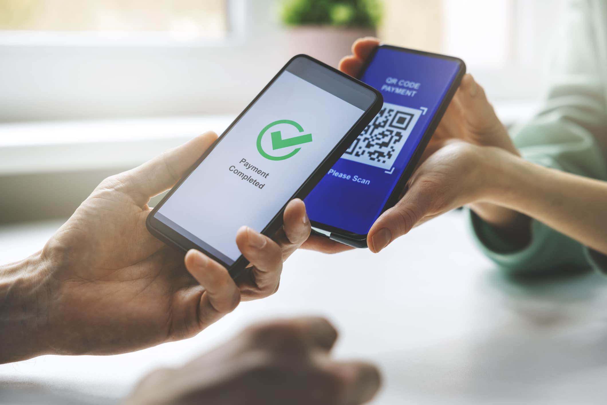 Close-up of a transaction occurring via a payment app, representing the growing concern with IRS payment app tax changes